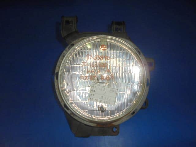 Left Headlight MITSUBISHI Toppo Bj 2000 GF-H42A — photo 1