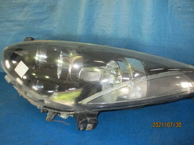 Left Headlight MAZDA Demio 2009 DBA-DE5FS P6515 — photo 2