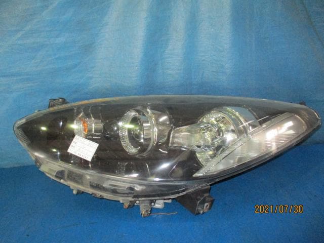 Left Headlight MAZDA Demio 2009 DBA-DE5FS P6515 — photo 1