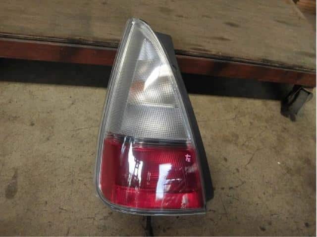 Left Tail Light SUZUKI MR Wagon 2002 LA-MF21S — photo 1