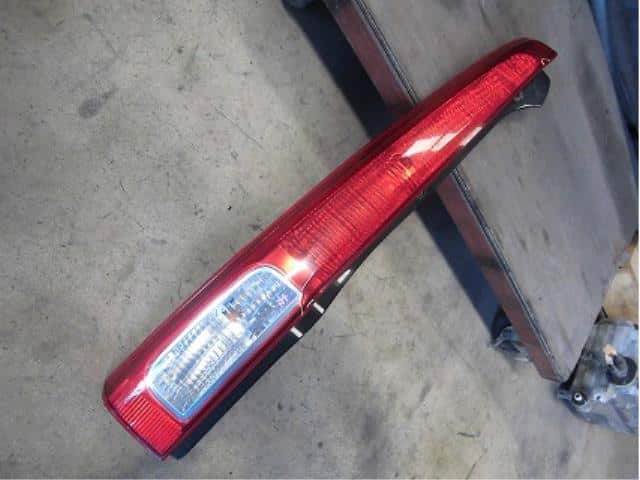 Left Tail Light DAIHATSU Move 2006 DBA-L150S — photo 1
