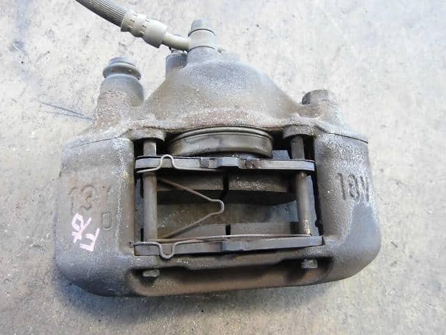 Front Right Caliper MAZDA Demio 1998 GF-DW3W — photo 1