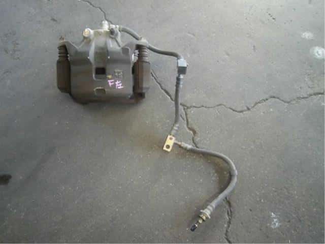 Front Left Caliper NISSAN Primera 2002 UA-QP12 — photo 1