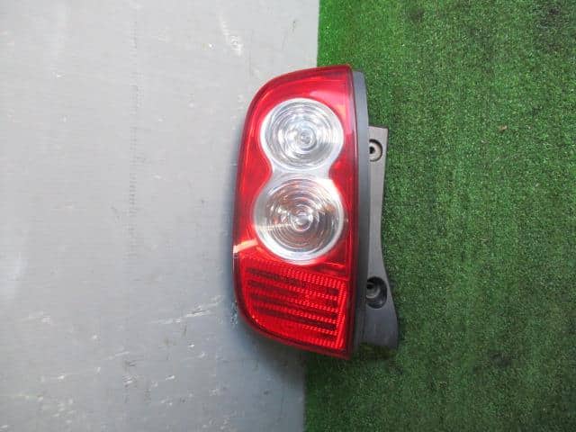 Left Tail Light NISSAN March 2006 DBA-AK12 — photo 1