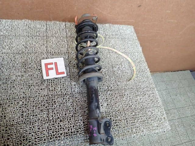 Front Left Strut NISSAN March 1996 E-HK11 — photo 1