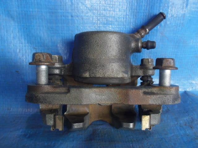 Front Left Caliper DAIHATSU Hijet 1994 V-S110P — photo 2