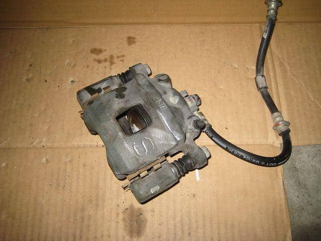 Front Left Caliper SUZUKI Wagon R 2004 UA-MH21S 5510273H01999 — photo 1