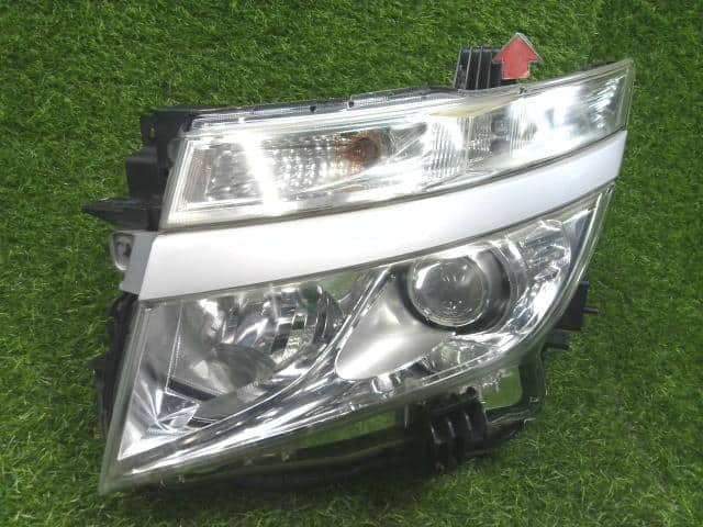 Left Headlight NISSAN Elgrand 2010 DBA-PNE52 — photo 1