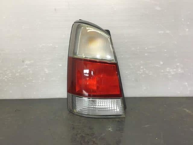 Left Tail Light SUBARU Pleo 2001 TA-RA1 — photo 1