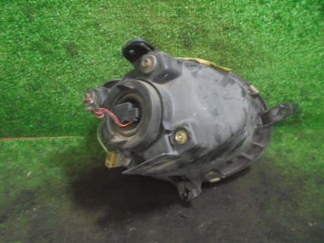 Left Headlight MITSUBISHI Minica 1997 V-H32V — photo 2