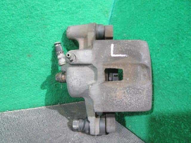 Front Left Caliper SUBARU Pleo 2002 TA-RA2 26292KE011 — photo 1