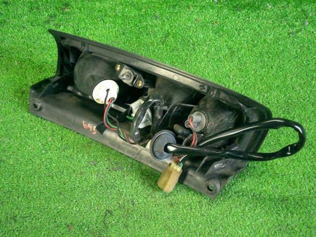 Left Tail Light SUZUKI Kei 2001 GF-HN21S 3567074G02 — photo 2