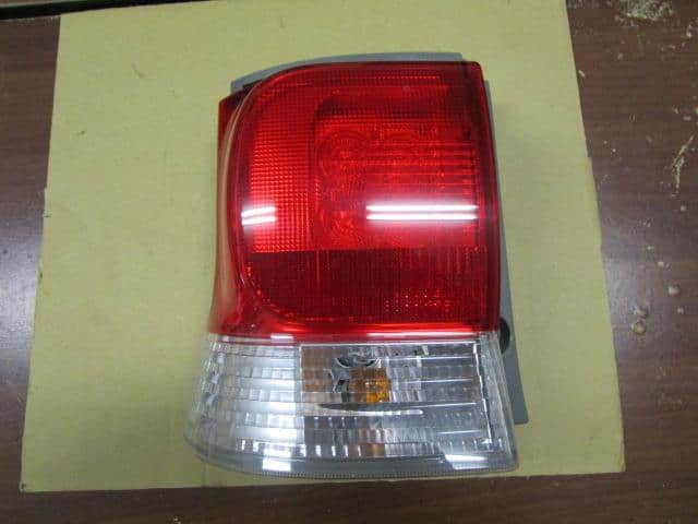 Left Tail Light DAIHATSU Tanto 2011 DBA-L385S — photo 1