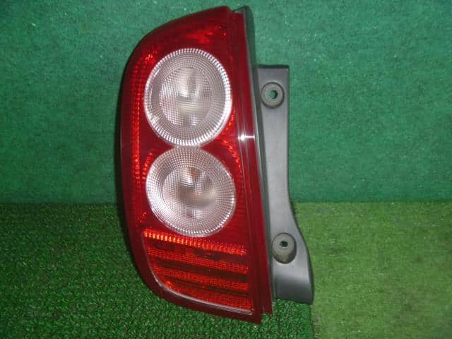 Left Tail Light NISSAN March 2002 UA-AK12 — photo 1