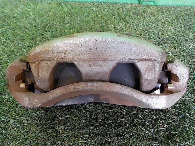 Front Left Caliper NISSAN Serena 2009 DBA-C25 — photo 1