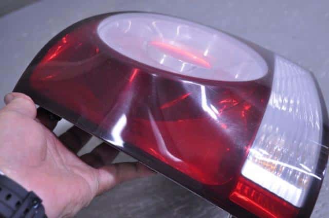 Left Tail Light VOLKSWAGEN Polo 2008 ABA-9NBUD — photo 6