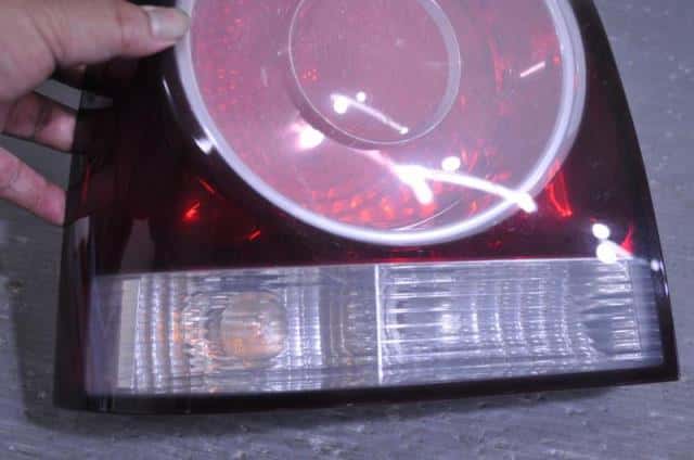 Left Tail Light VOLKSWAGEN Polo 2008 ABA-9NBUD — photo 5