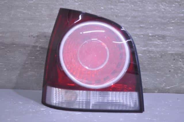 Left Tail Light VOLKSWAGEN Polo 2008 ABA-9NBUD — photo 1