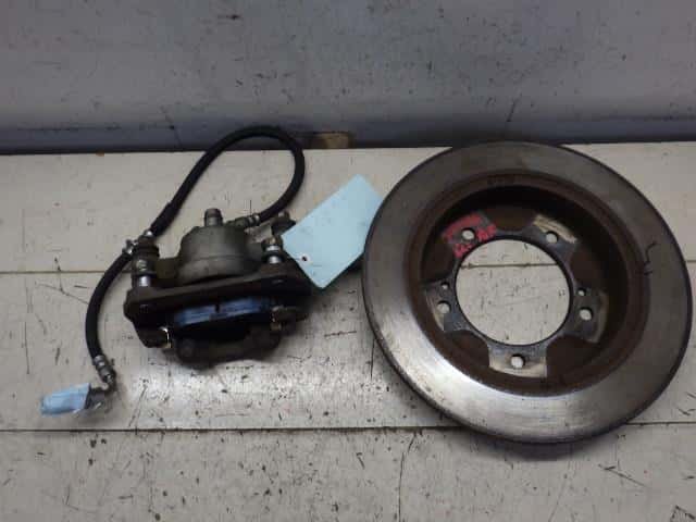 Front Left Caliper SUZUKI Jimny 2009 ABA-JB23W — photo 2