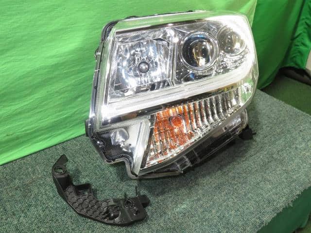 Left Headlight DAIHATSU Tanto 2017 DBA-LA600S — photo 1