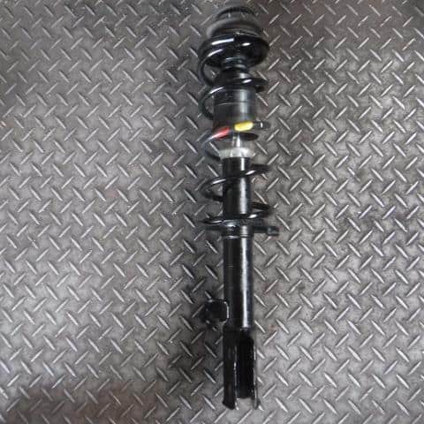 Front Left Strut NISSAN March 2013 DBA-NK13 — photo 1