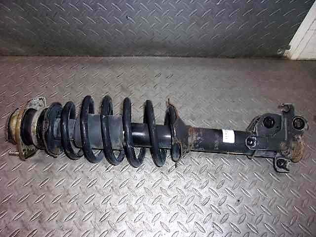 Front Left Strut TOYOTA Duet 2002 UA-M100A 4852097428 — photo 2