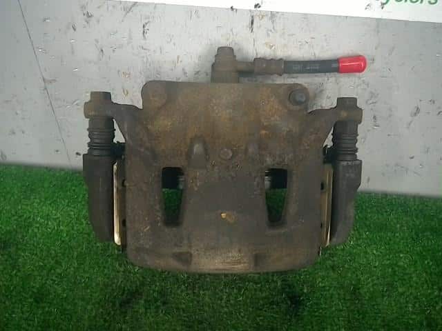 Front Left Caliper NISSAN Serena 2013 DBA-NC26 — photo 1