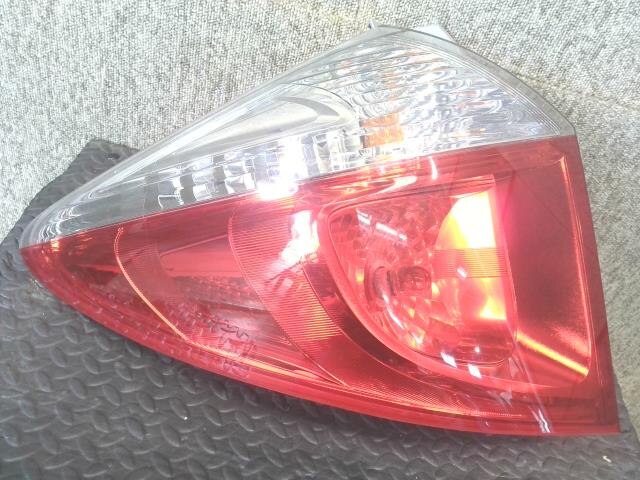 Left Tail Light TOYOTA Ractis 2010 DBA-NSP120 — photo 1