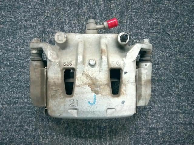 Front Left Caliper NISSAN Leaf_ 2018 ZAA-ZE1 — photo 1