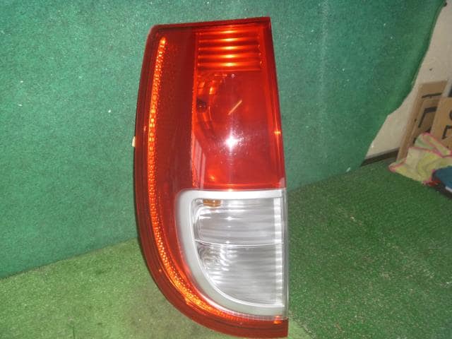 Left Tail Light NISSAN Moco 2006 DBA-MG22 — photo 1
