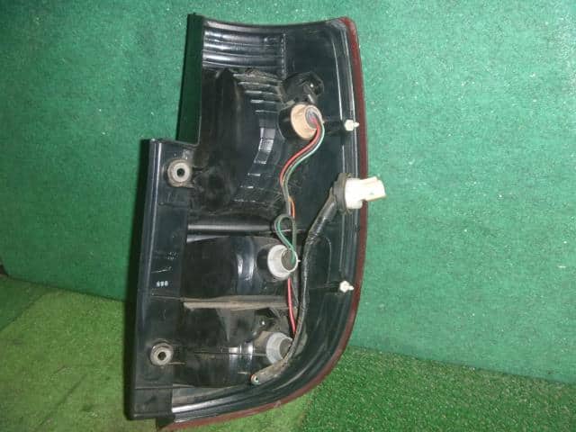 Left Tail Light NISSAN Moco 2006 DBA-MG22 — photo 2