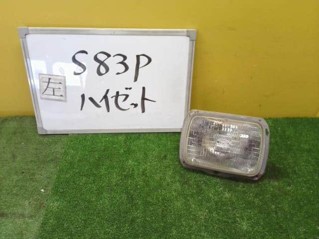 Left Headlight DAIHATSU Hijet 1992 V-S83P 8111087D86000 — photo 1
