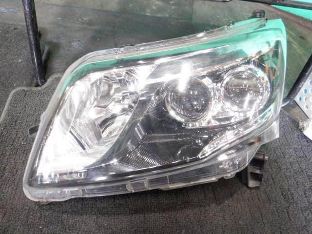 Left Headlight DAIHATSU Move 2014 DBA-LA100S — photo 1