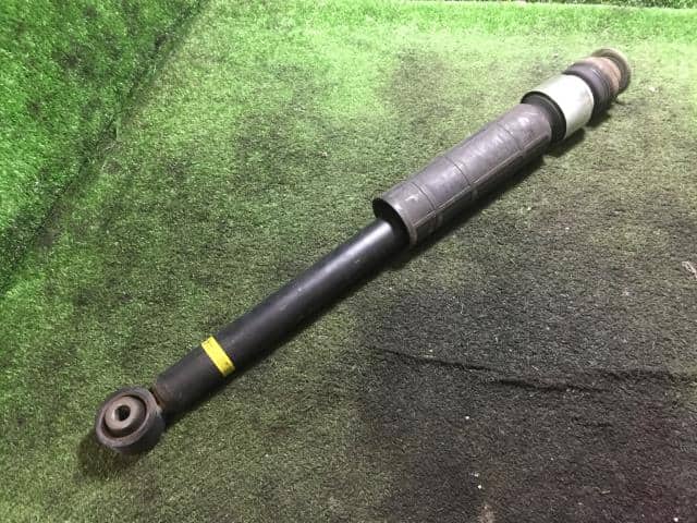 Rear Left Shock Absorber SUZUKI Alto 2019 DBA-HA36S — photo 1