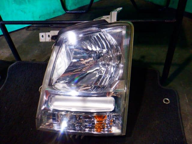 Left Headlight SUZUKI Wagon R 2004 CBA-MH21S — photo 3