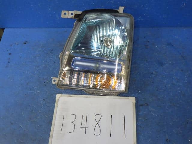 Left Headlight SUZUKI Wagon R 2004 CBA-MH21S — photo 1