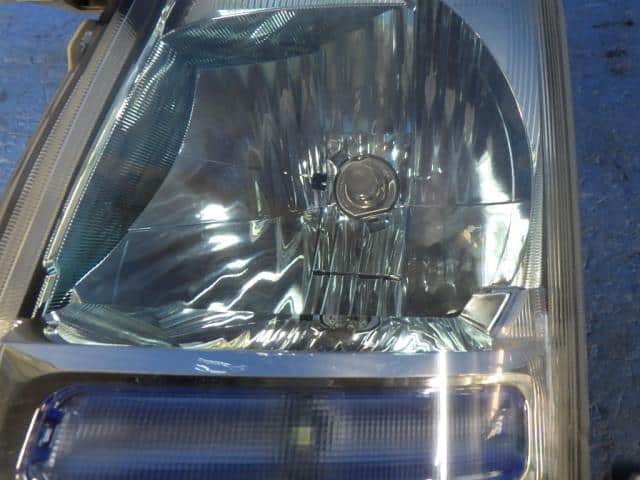 Left Headlight SUZUKI Wagon R 2004 CBA-MH21S — photo 2
