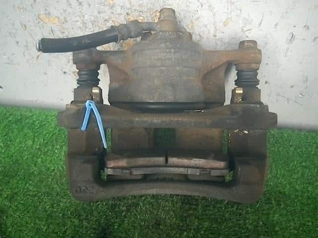 Front Left Caliper MAZDA Demio 2012 DBA-DE3FS D65133990E — photo 2