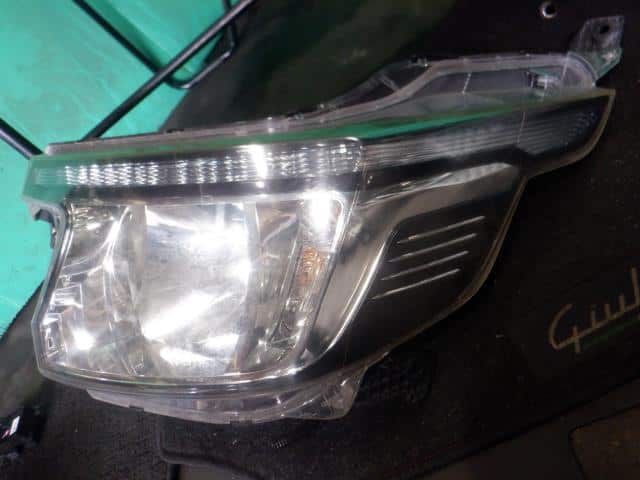 Left Headlight HONDA N-wgn 2013 DBA-JH1 — photo 2