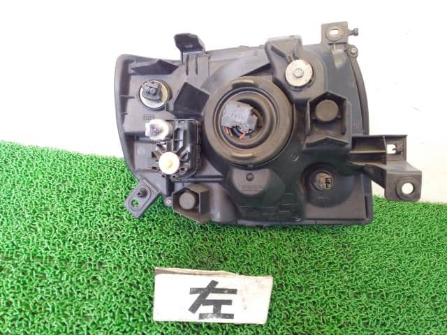 Left Headlight MITSUBISHI Pajero Mini 2009 ABA-H53A 8301B209 — photo 4