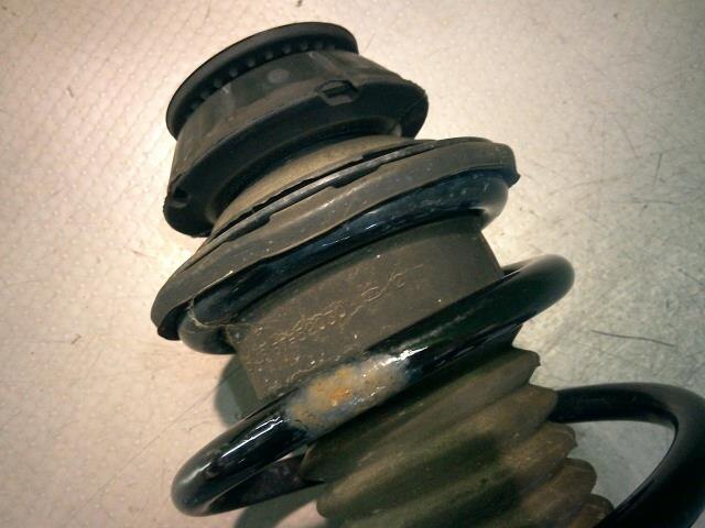 Front Left Strut TOYOTA Ractis 2007 DBA-SCP100 — photo 2