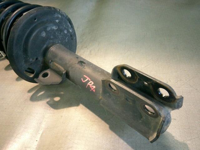 Front Left Strut TOYOTA Ractis 2007 DBA-SCP100 — photo 5