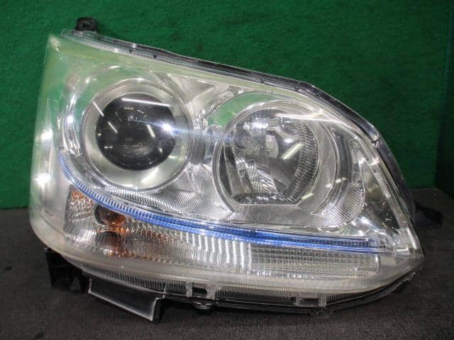 Right Headlight DAIHATSU Move 2011 CBA-LA100S — photo 1