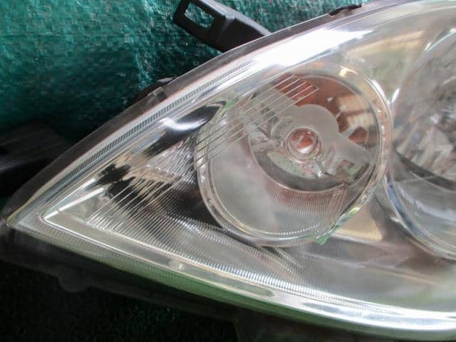Left Headlight NISSAN Note 2008 DBA-E11 — photo 4