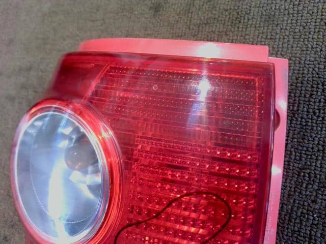 Left Tail Light DAIHATSU Tanto 2006 CBA-L350S — photo 3