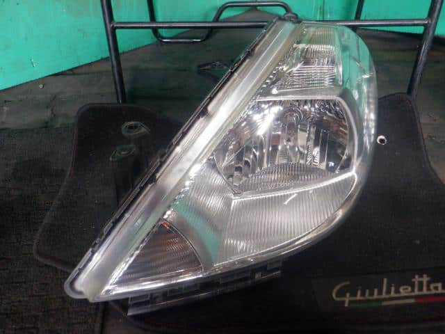 Left Headlight NISSAN Tiida 2005 DBA-C11 — photo 1