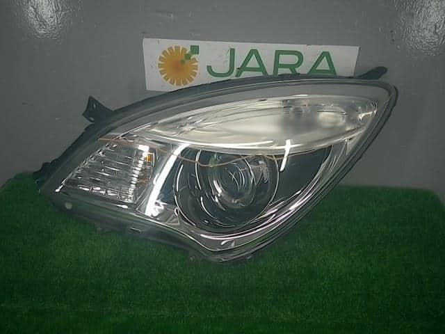 Left Headlight MITSUBISHI Delica D2 2013 DBA-MB15S — photo 1
