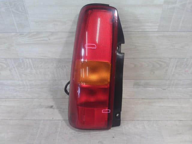 Left Tail Light SUZUKI Jimny 2005 ABA-JB23W 3567081A00 — photo 1