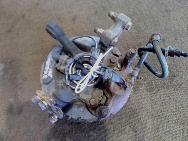 Front Left Knuckle Hub Assembly TOYOTA COROLLA 1998 GF-EE111 4321212260 — photo 1