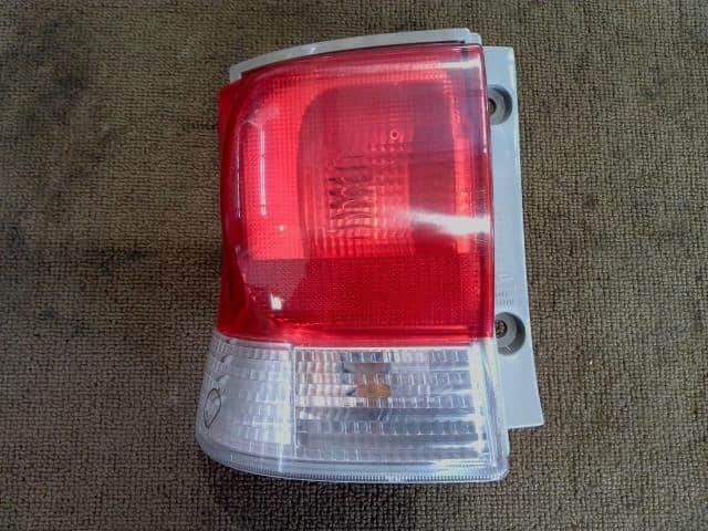 Left Tail Light DAIHATSU Tanto 2008 DBA-L375S — photo 1